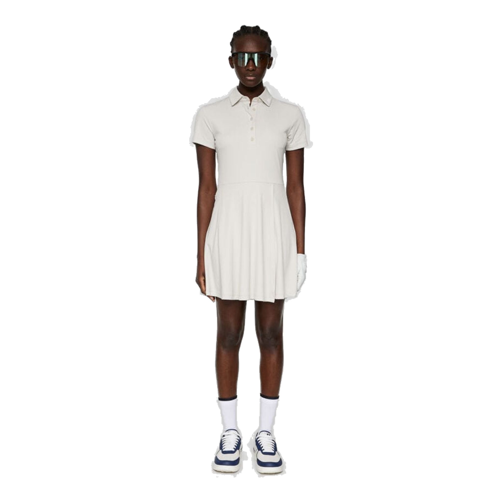 J. Lindeberg Janna oblieka ženy